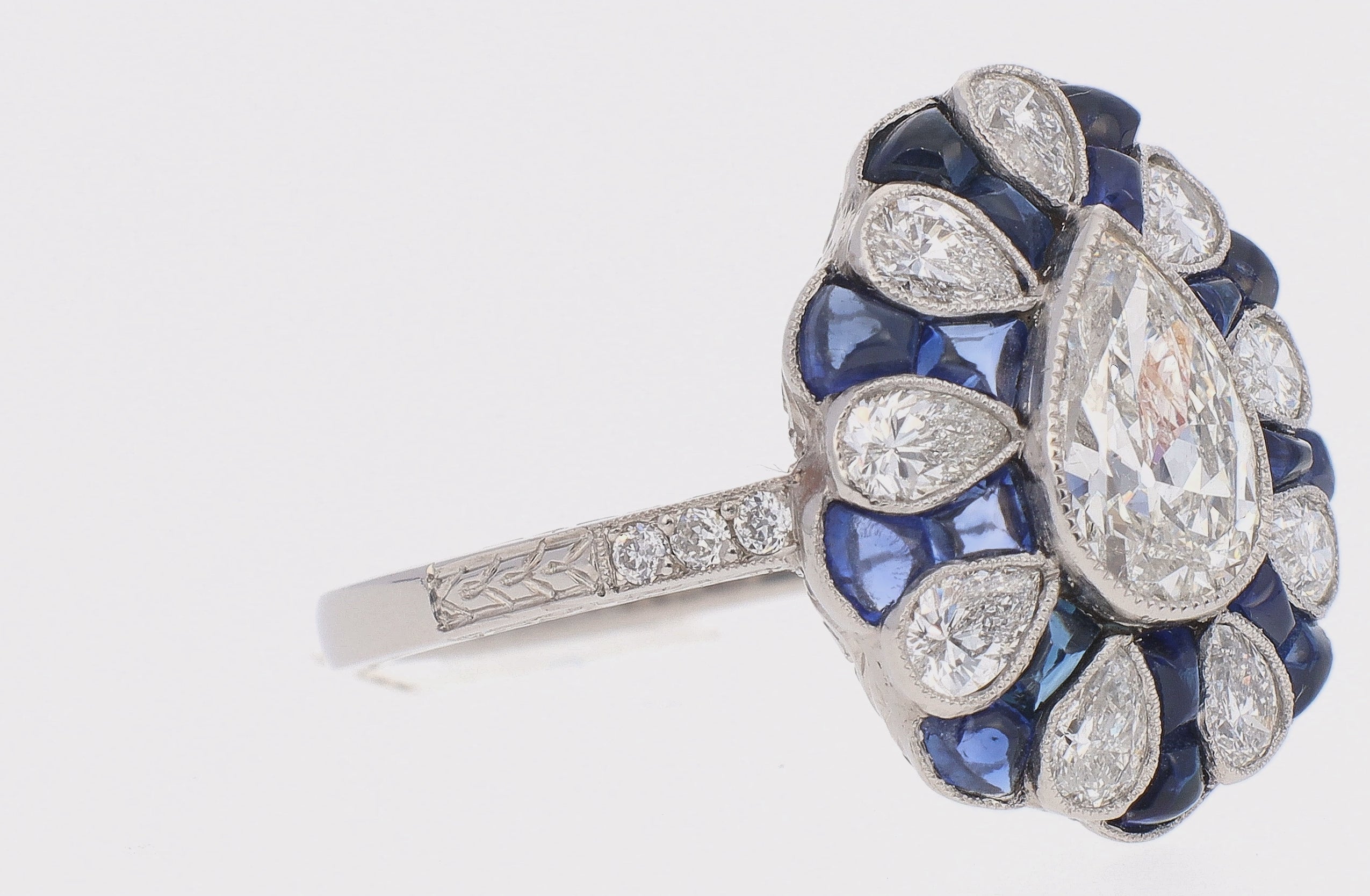 Platinum Antique Pear Shaped Diamond and Sapphire Fashion Ring